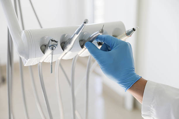 Professional Root Canal Treatment technician working in Wayne City, IL